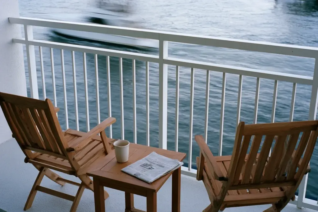 Two empty balcony chairs facing the Intracoastal on a cool overcast morning in Fort Lauderdale